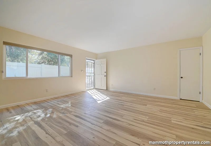 Living room with historic charm and modern updates.