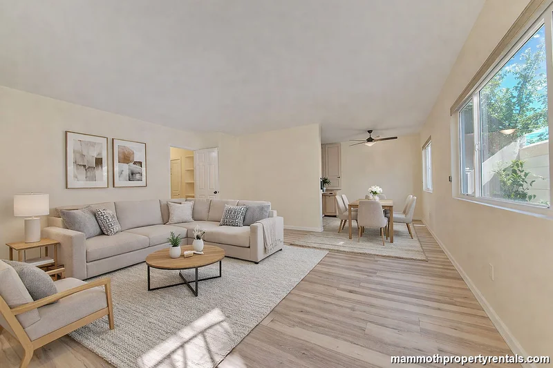 Living and dining area - showing the versatile layout of this open-concept Long Beach apartment.