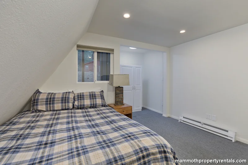 Bedroom one with queen bed