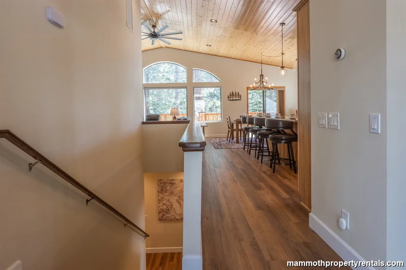 Stairs go down to bedrooms